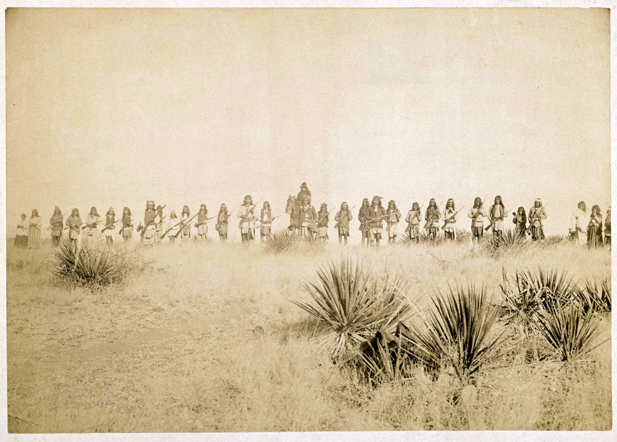 Printed on Back of Photo: "Scene in Geronimo's camp, the Apache outlaw and murderer. Taken before the surrender to Gen. Crook, March 27, 1886, in the Sierra Madre mountains of Mexico, escaped March 30, 1886." This photo of Geronimo and his men was taken by C.S. Fly. His 15 images of the Apache are the only known photographs taken of an American Indian while they were still at war with the U.S.